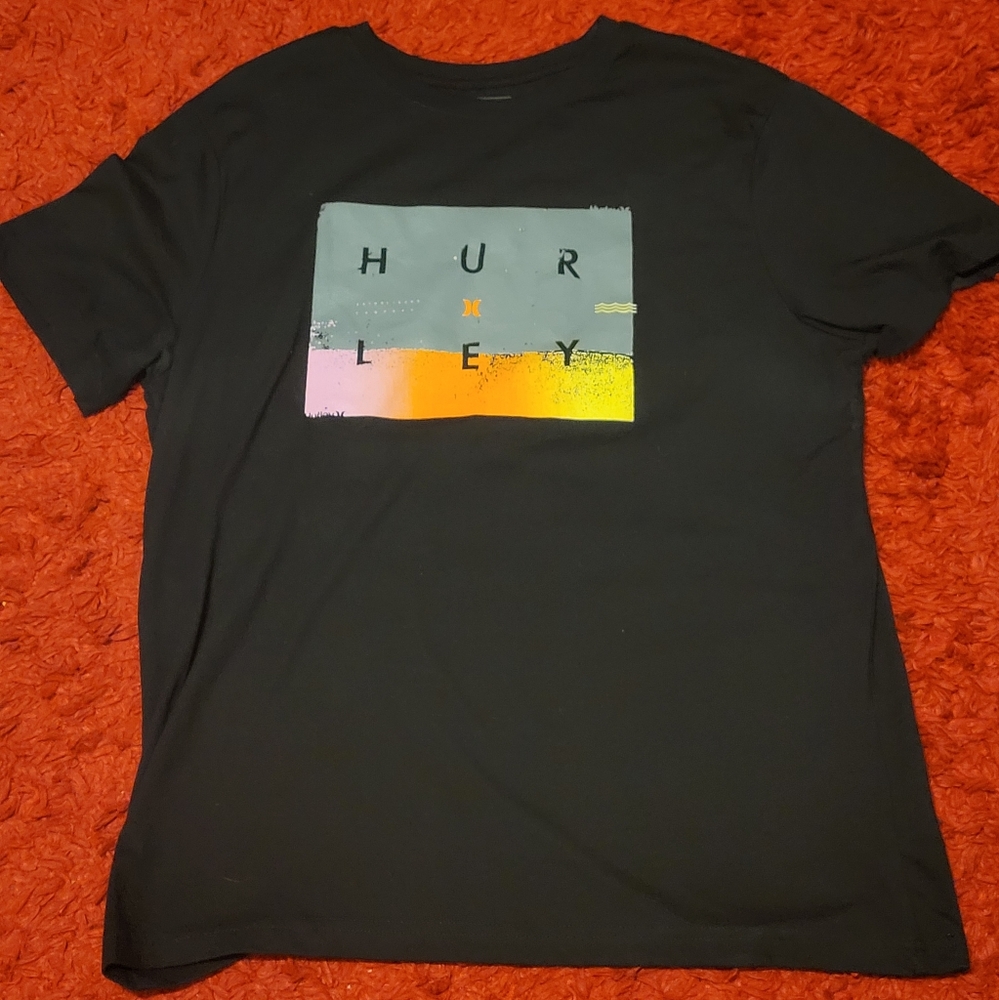 black and warm colored Hurley tee shirt men's size large